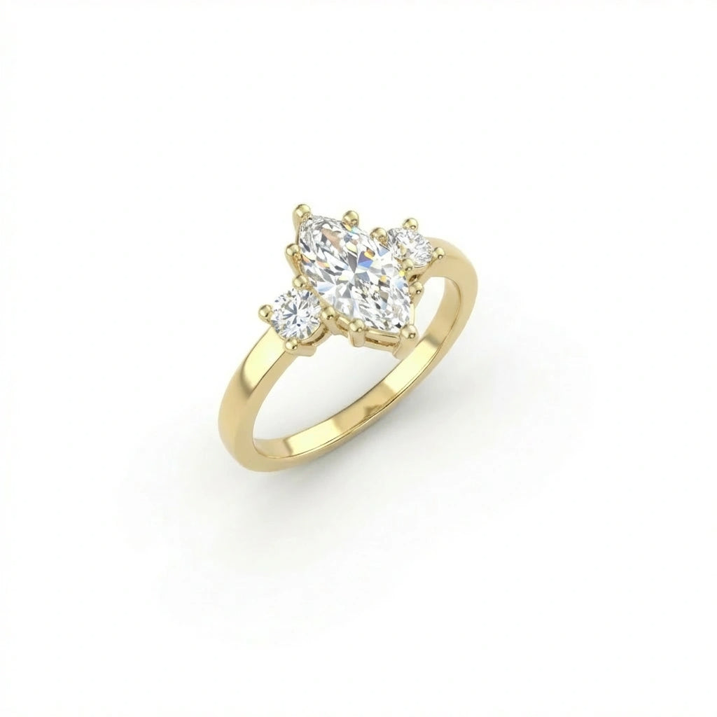 Vela marquise diamond engagement ring in solid 14K yellow gold with three-stone setting, angled view showing elongated center diamond