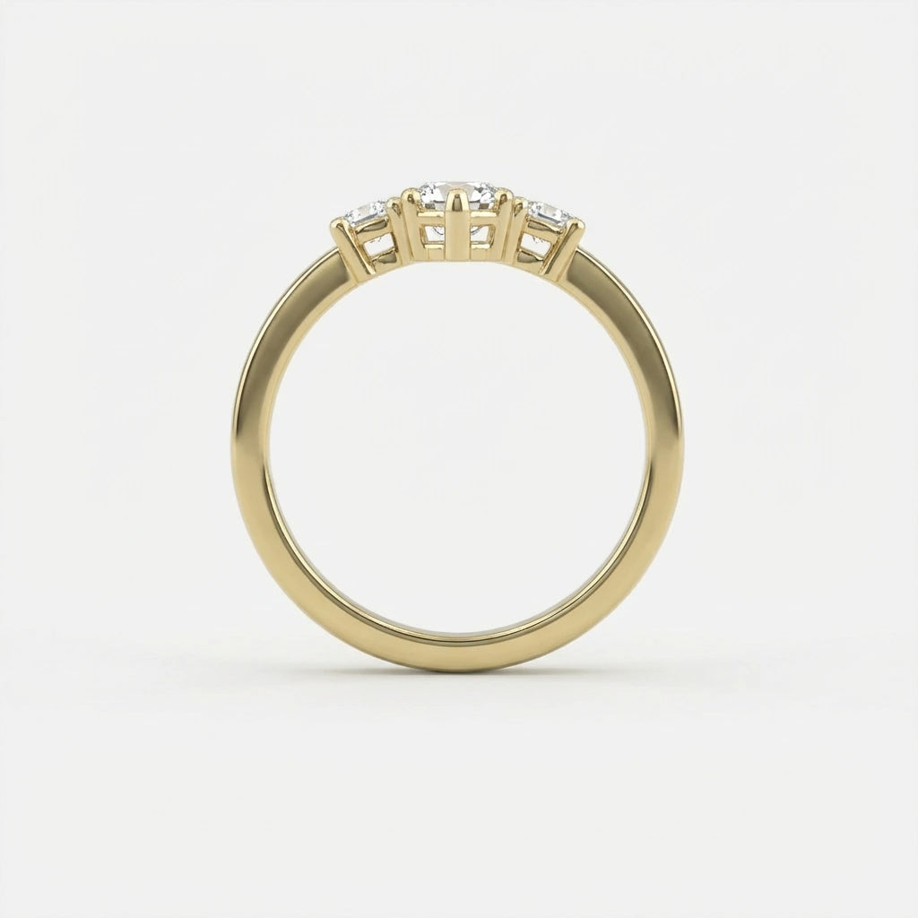 Vela marquise diamond engagement ring side profile showing prong setting and three-stone diamond structure in 14K yellow gold