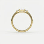Vela marquise diamond engagement ring side profile showing prong setting and three-stone diamond structure in 14K yellow gold