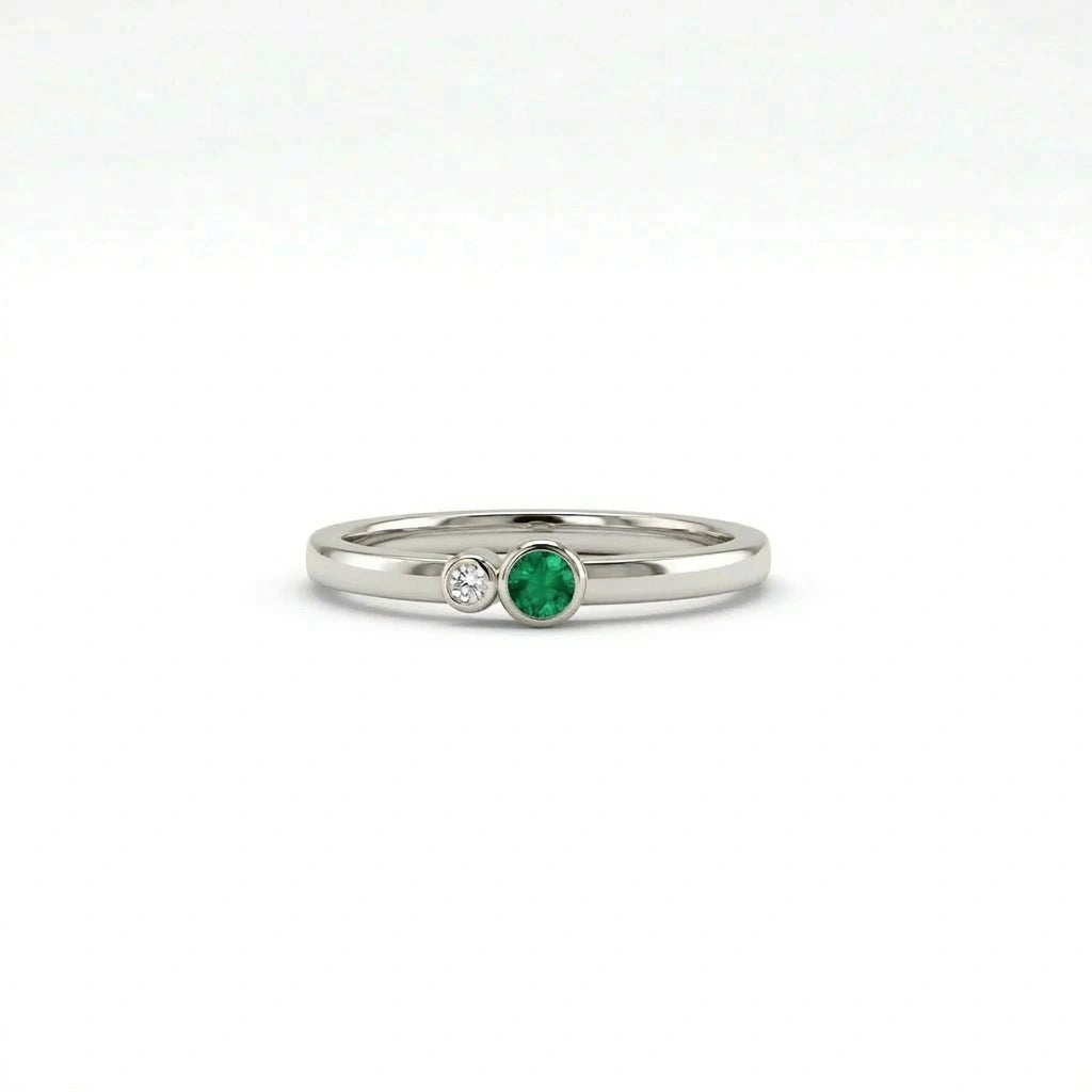 Bezel set diamond and emerald duo ring in 14k white gold front view