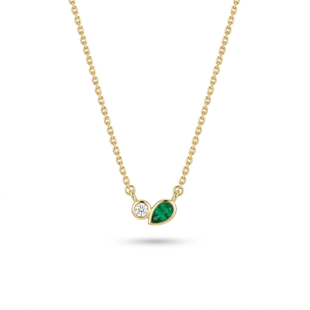Minimalist pear emerald and diamond necklace in solid 14k yellow gold