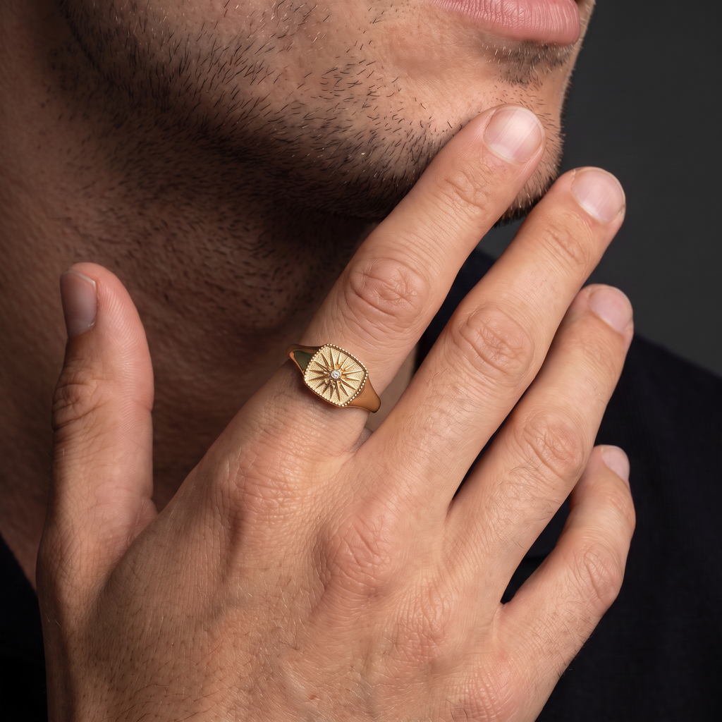 Greek Vergina Sun signet ring in 14K gold worn on a man's hand
