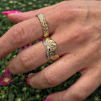 Vintage Scroll gold diamond ring, close up view on hand