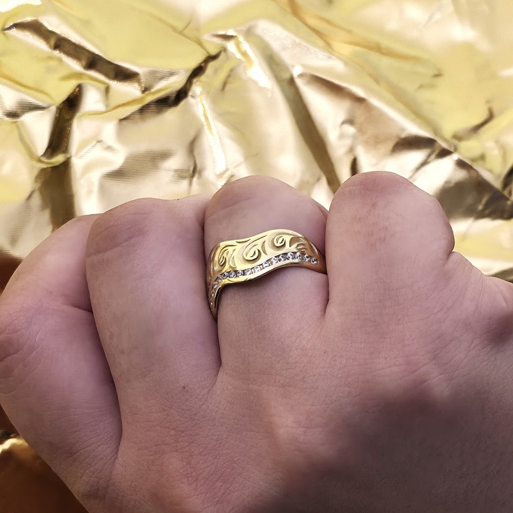 Angled view of Vintage Scroll Wave Diamond Ring with wave design and diamonds on hand