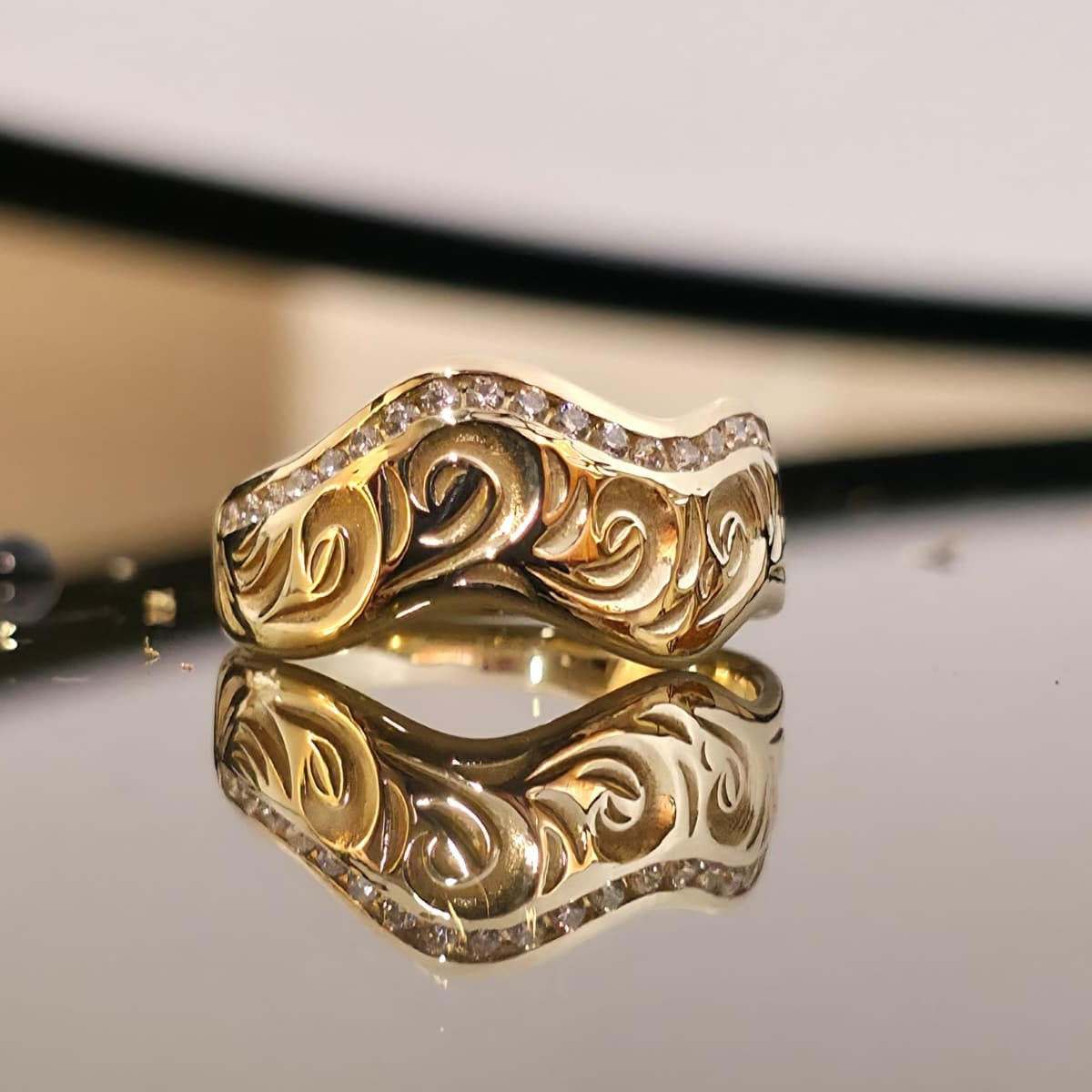 Front view of Vintage Scroll Wave Diamond Ring in 14K gold with diamond accents
