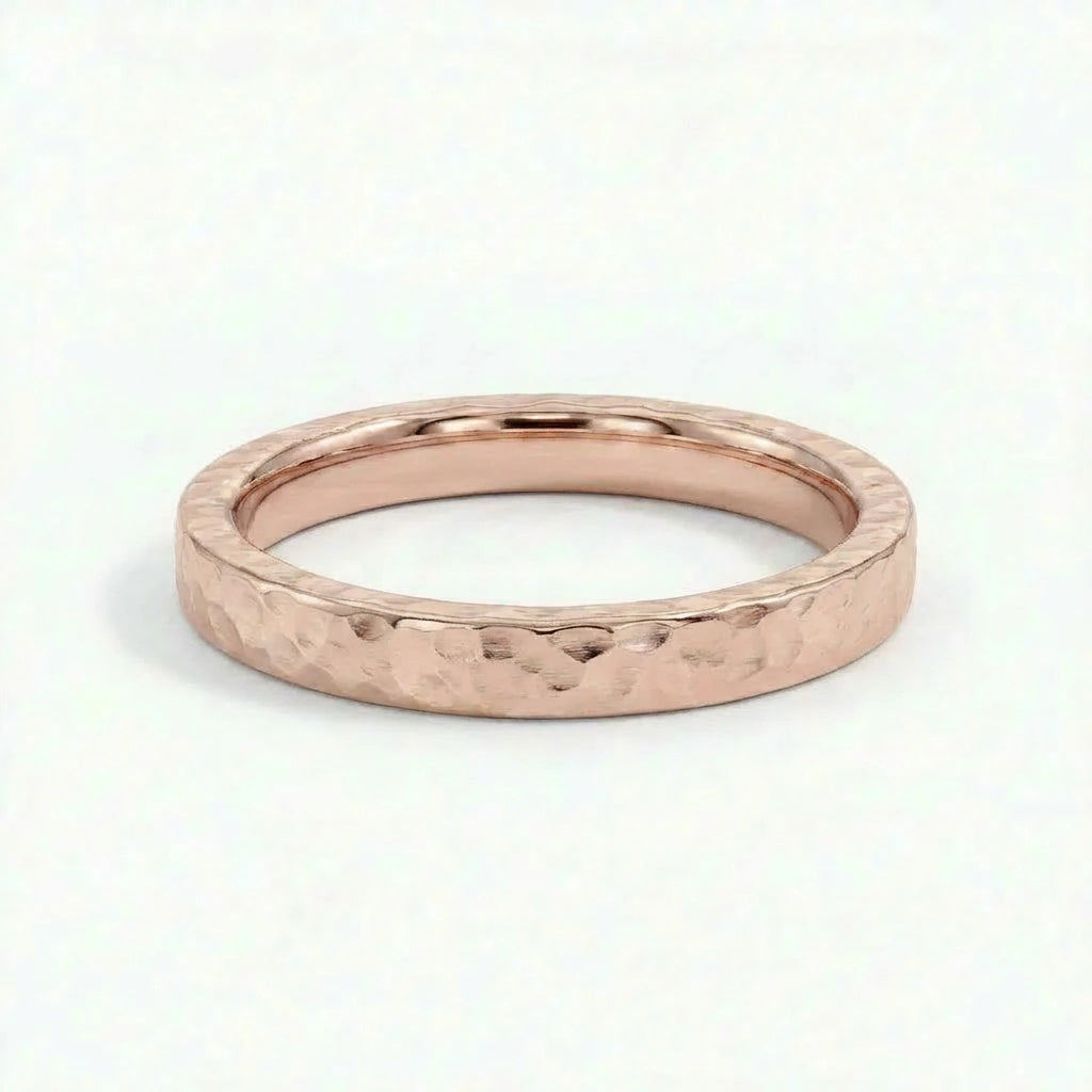 Virel hammered gold band in solid 14K rose gold with textured handcrafted finish and flat profile