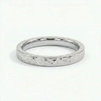 Virel hammered gold band in solid 14K white gold with hammered texture and clean modern profile
