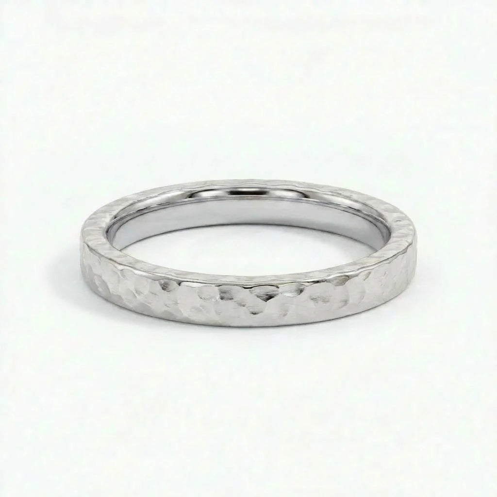 Virel hammered gold band in solid 14K white gold with hammered texture and clean modern profile