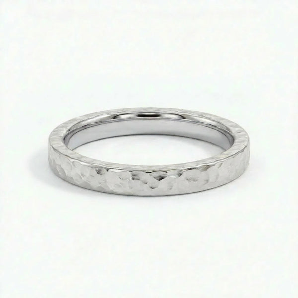 Virel hammered gold band in solid 14K white gold with hammered texture and clean modern profile