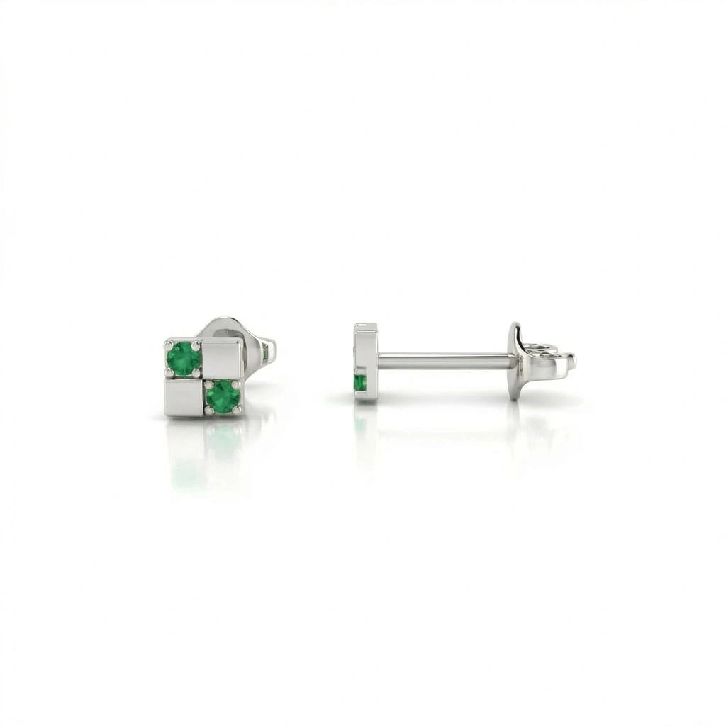 Zyven emerald matrix stud earrings in solid white gold featuring geometric square grid design with green emerald stones
